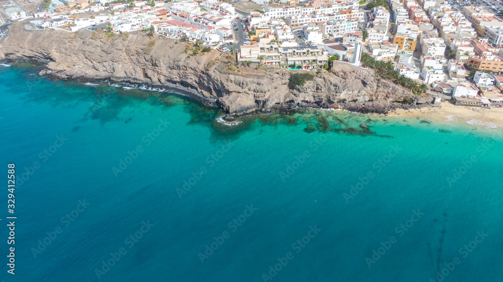 Morro Jable Canary Island, Fuerteventura Spain, Aerial view on coast of atlantic ocean and beach, Drone shot of sea 