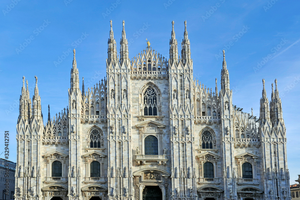 Fototapeta premium Italy - Milan january22,2018 - spiers of the Milan Cathedral and the madonnina, symbol of the city - Duomo and downtown