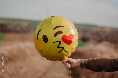 Canvas Print girl with balloon emoji