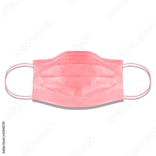 Typical 3-ply medical mask isolated on white. hard lighted, harsh shadow. Pink surgical ear-loop mask. Surgical mask with rubber ear straps to cover the mouth and nose. Procedure mask from bacteria.