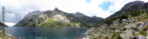 Panoramic view of the Cavallers Reservoir and the groundhog route. Aigüestortes National Park and Lake Sant Maurici, the Pyrenees Mountains, Catalonia