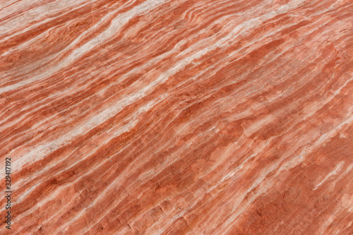 Detail on layers of sandstone at Fire wave during wonderful sunny day in Valley of Fire State Park, Nevada, USA