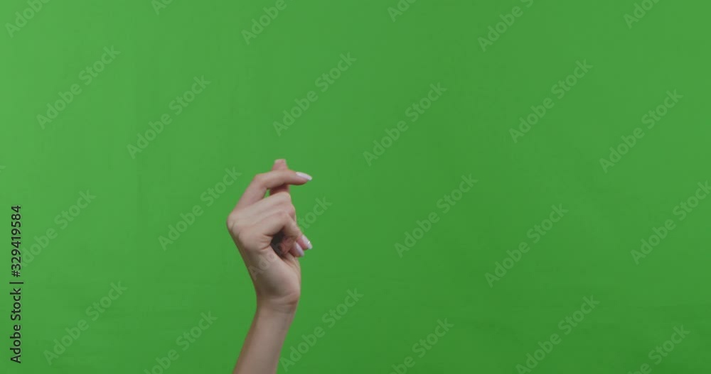 Woman snapping her fingers over chroma key background Woman snapping her fingers over chroma key background
