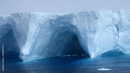 Very large iceberg on a foggy day, near King George island, Antarctica.