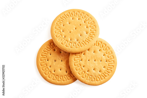Round cookies on a white background. Wheat biscuits on the table. Morning breakfast cracker snack. Wheat light meal snack in lunch time.