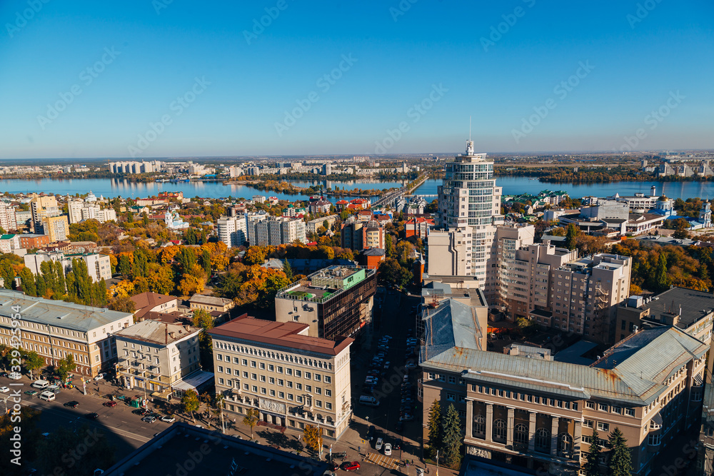 Sunny golden autumn Voronezh. Aerial view from skyscraper roof heigh