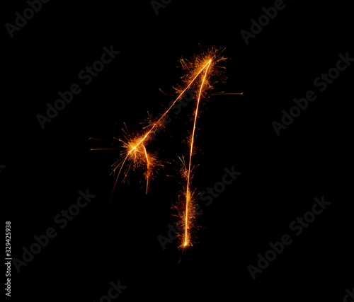 number one written with a sparkler on a black background