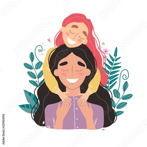 Beautiful young woman and her charming little daughter. Girl hugs mom and smiles