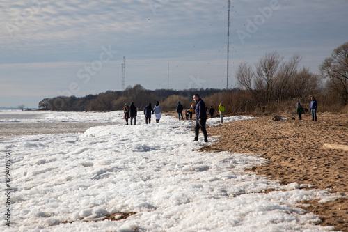 Vacationers on the shore of the Gulf of Finland near St. Petersburg.
