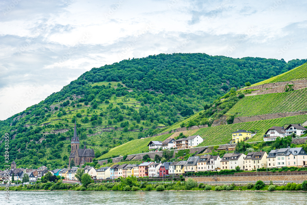 Germany, Rhine Romantic Cruise, a large body of water with a mountain in the background