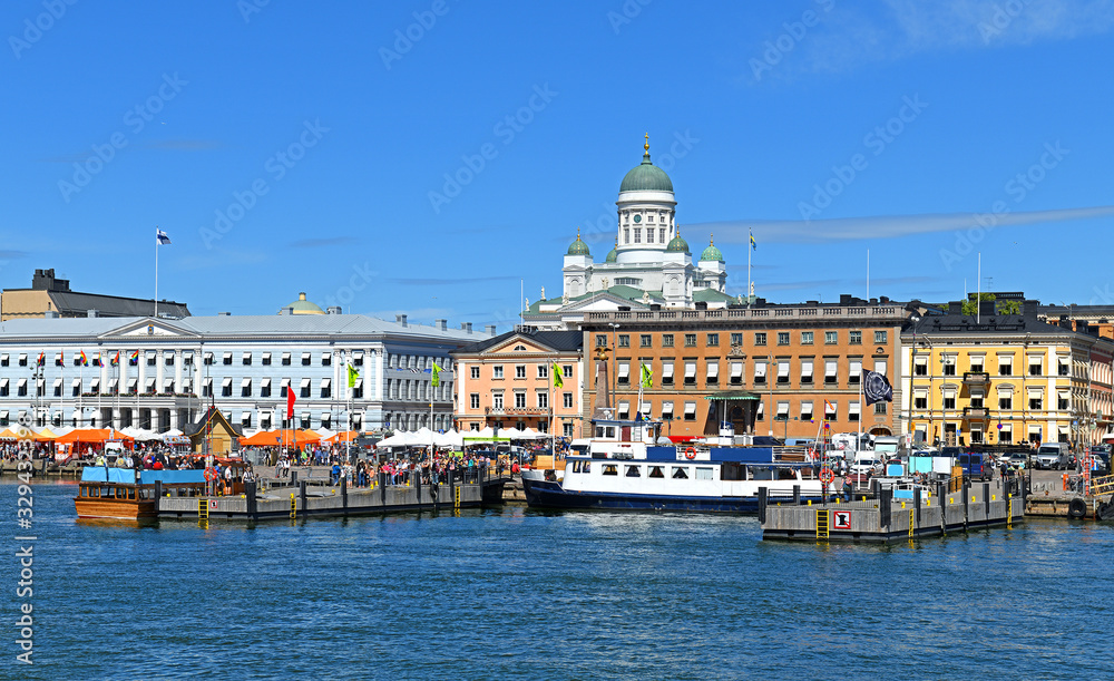 Market Square (Kauppatori) and South Harbor on background of Evangelical Lutheran cathedral of Diocese, in summer