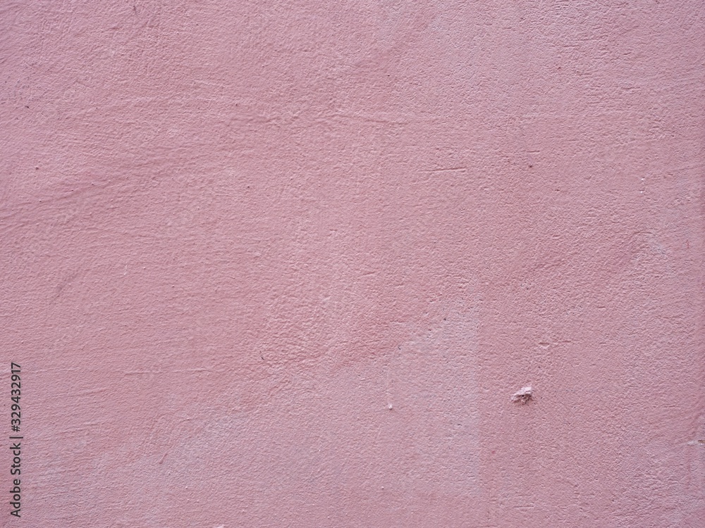 Fototapeta premium texture colored wall of an old building in a big city