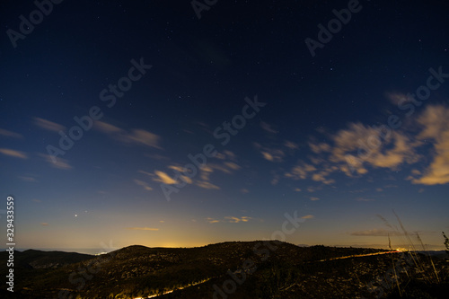 Starry night in the Garraf Natural Park, Catalonia, Spain. View just after sunset.