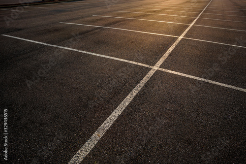 Empty parking lot at dusk © Hongzhong
