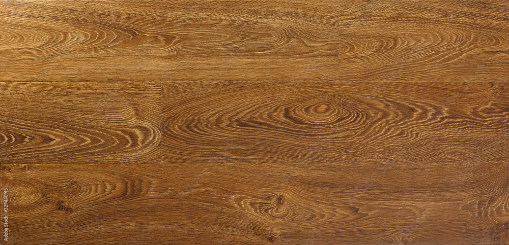 Fototapeta premium Wooden natural texture. New parquet blank. Wooden laminate floor boards background image. Home decor.