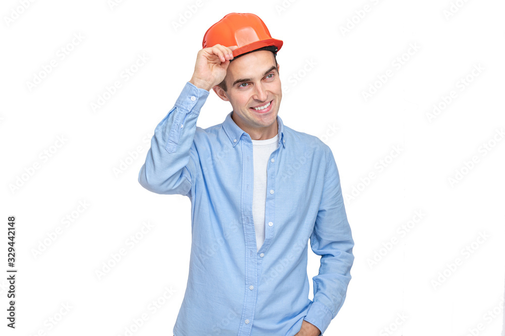 Builder takes off his helmet and smiling, isolated background, copy space Builder takes off his helmet and smiling, isolated background, copy space