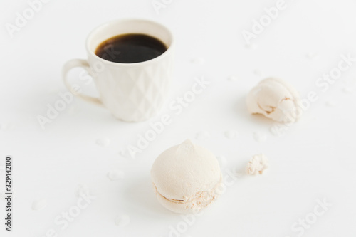 cup of coffee with marshmallows.white background.minimalistic style