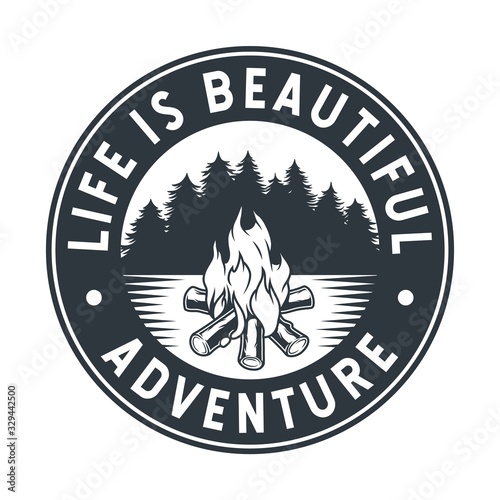 Monochrome emblem of burning campfire with flame