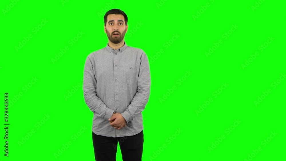 Brunette guy is reporting and telling a lot information. Green screen Brunette guy is reporting and telling a lot information. Green screen
