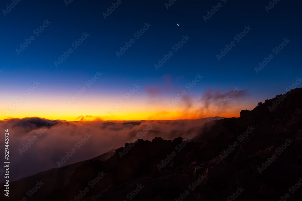 Spectacular golden sunrise on Haleakala volcano on Maui island, Hawaii