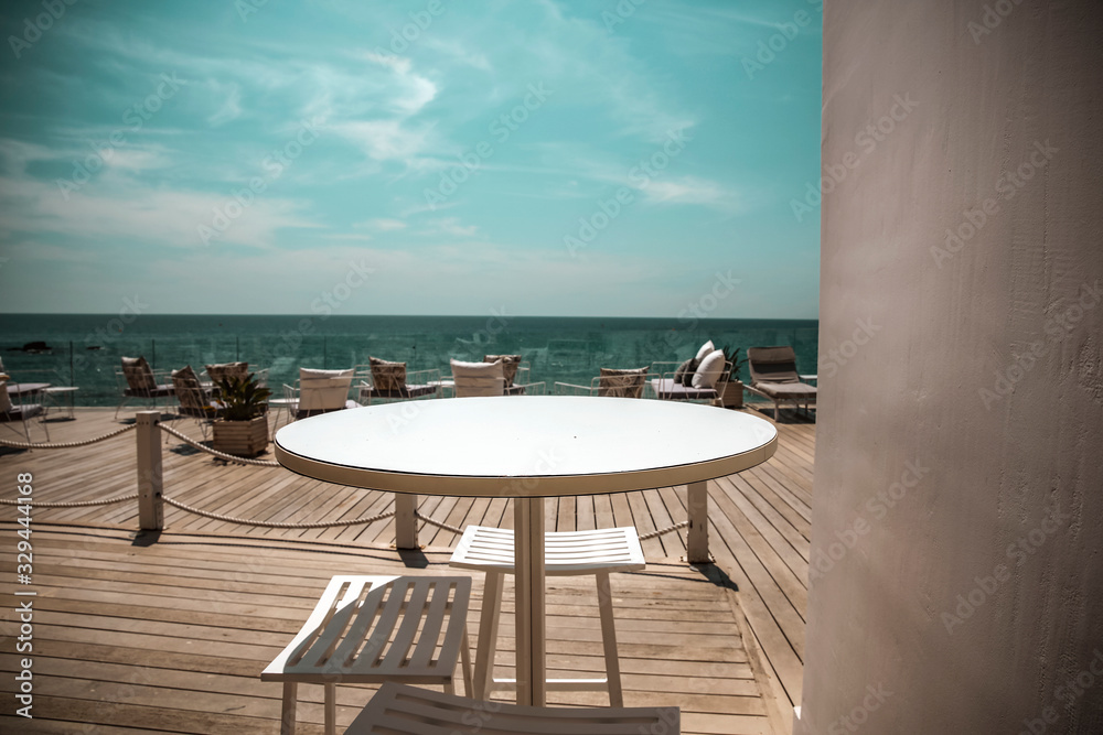 Fototapeta premium white wooden table of free space and sea landscape 