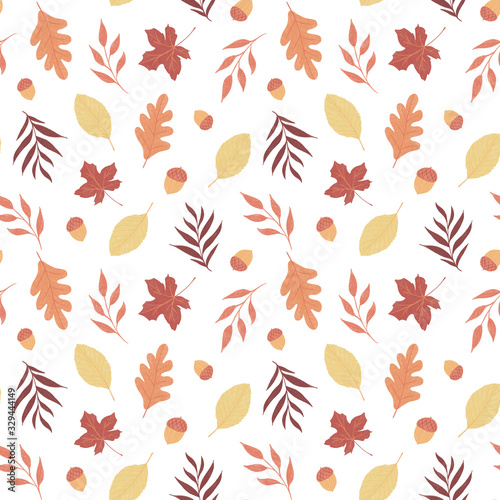 Seamless pattern of hand drawn autumn yellow  orange  red  brown leaves and acorn on a white isolated background. Maple  ash  beech birch oak leaf. Use in postcard  wallpaper  design  textile