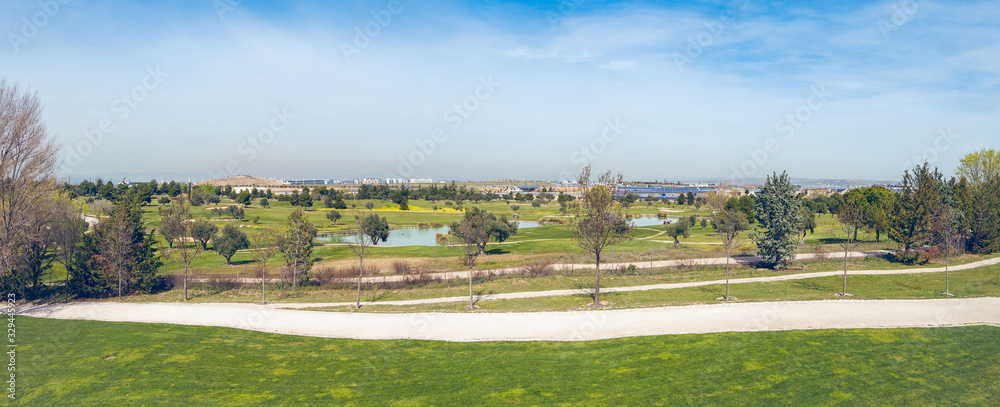 Madrid golf course and air pollution on a sunny day Madrid golf course and air pollution on a sunny day