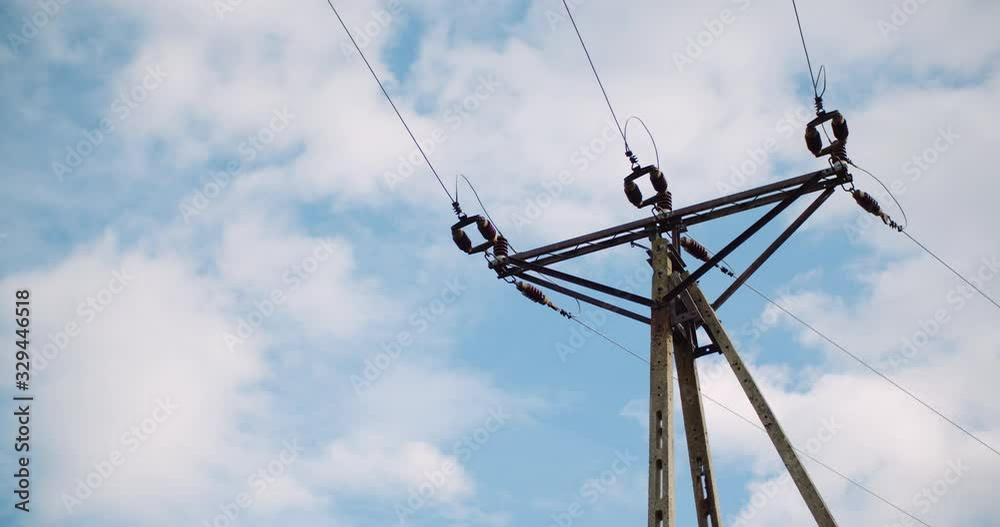 Energy pole against beautiful cloudscape Energy pole against beautiful cloudscape