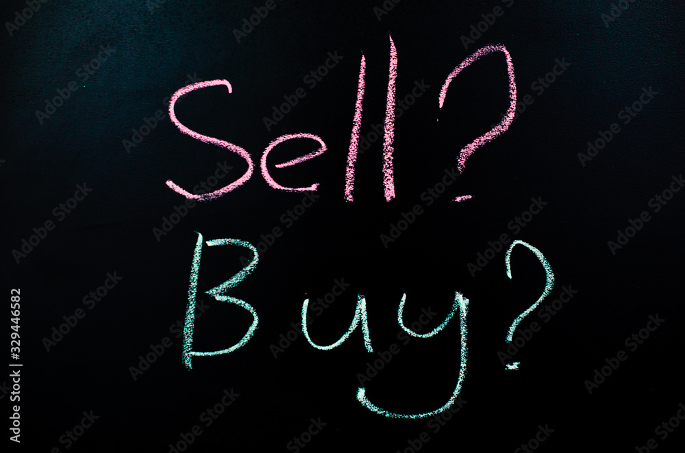 Negative chart in the red zone on the chalkboard. BUY and SELL inscription Negative chart in the red zone on the chalkboard. BUY and SELL inscription
