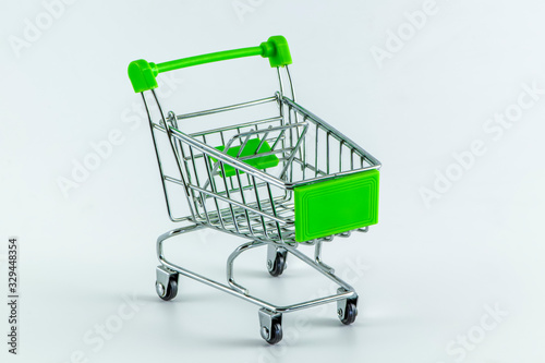 Empty shopping cart on white background