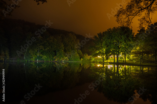 night over calm remote lake, long shutter speed