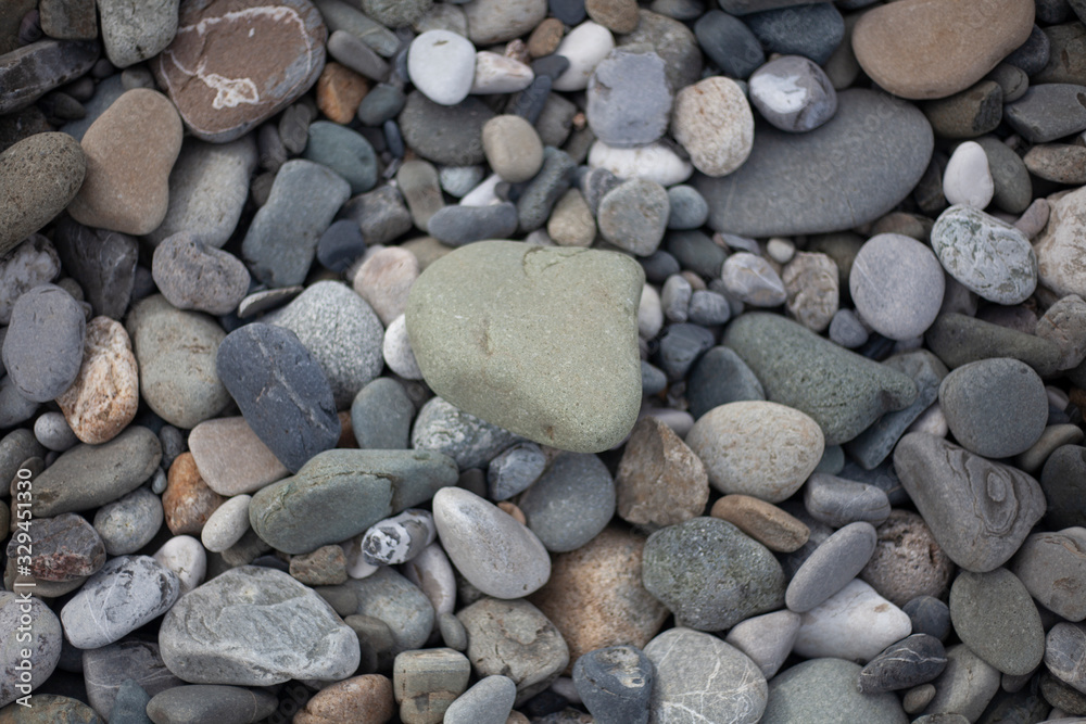 Texture pebbles. Large stones. Beautiful background. Coast. Beautiful gray beach. Texture pebbles. Large stones. Beautiful background. Coast. Beautiful gray beach.