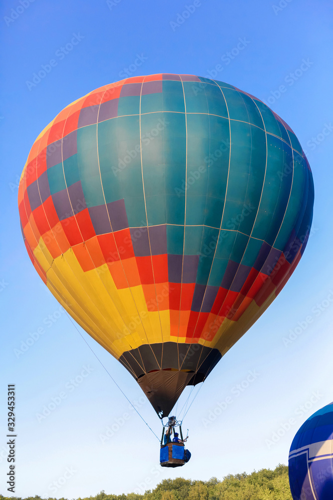 Fototapeta premium Balloon Festival. Flying balloons against the blue sky.