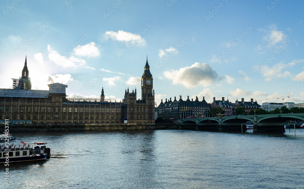 Big Ben and Parliament in London against the sky, restoration of watches, Gothic architecture