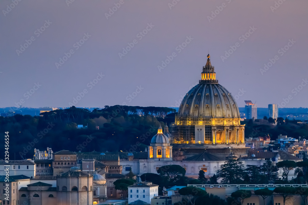 Panoramic view of Rome city with the dome of St. Peter's Basilica.