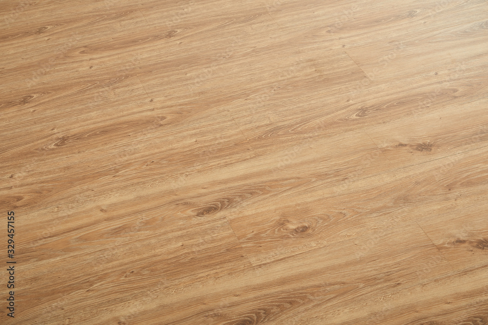 Naklejka premium Wooden natural texture. New parquet blank. Wooden laminate floor boards background image. Home decor.