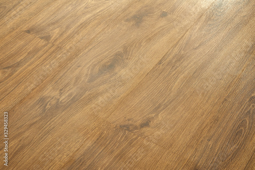 Wooden natural texture. New parquet blank. Wooden laminate floor boards background image. Home decor.