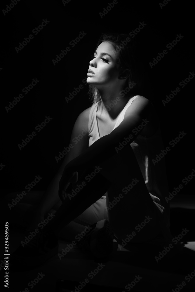 black and white portrait of fashion beautiful model, brunette girl with freckles in studio, close up, young woman head shot black and white portrait of fashion beautiful model, brunette girl with freckles in studio, close up, young woman head shot