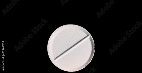 Pills. Medical pills and capsules. Isolated on a black background. A fast-dissolving, effervescent tablet, allergy pill, antibiotics. Virus(Viral) and flu Diseases in Winter.Covid-19 coronavirus.