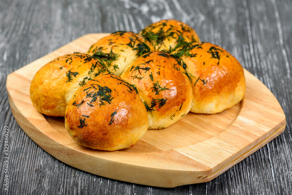 Yeast unsweetened buns with garlic and vegetable oil. Garlic bread, buns 