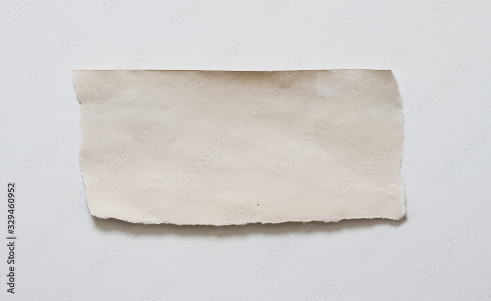 Old ripped paper isolated on white paper background with copy space for text Old ripped paper isolated on white paper background with copy space for text