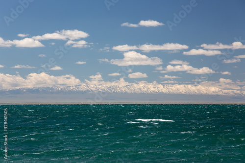 Lake in Mogolia in front of mountains photo