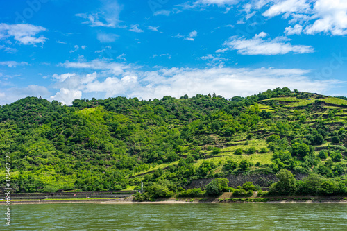 Germany, Rhine Romantic Cruise, a large green landscape with a body of water