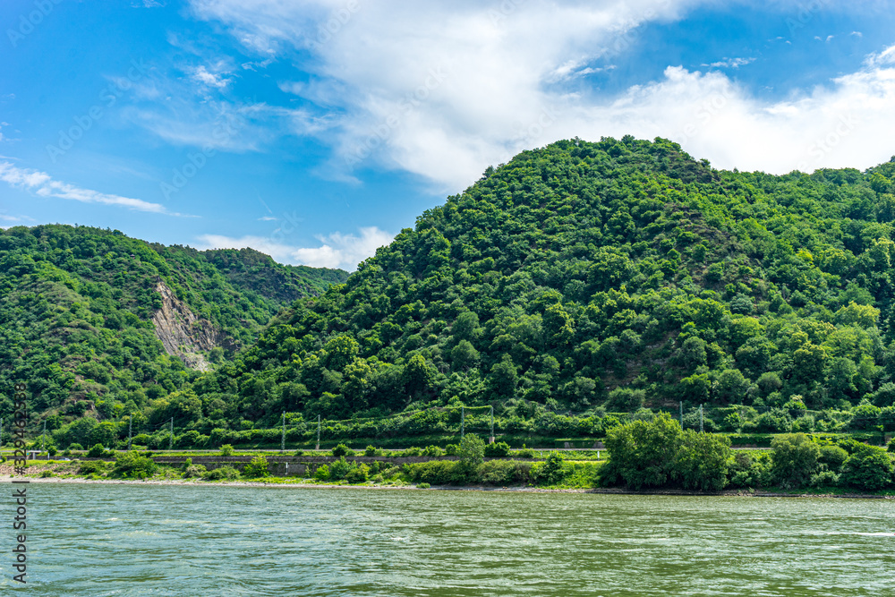 Germany, Rhine Romantic Cruise, a large body of water surrounded by trees