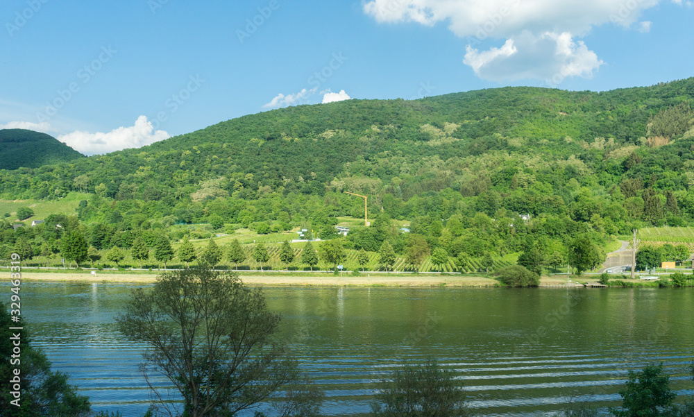 Germany, Hiking Frankfurt Outskirts, a body of water with a mountain in the background