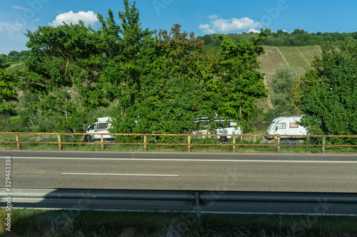 Wallpaper Mural Germany, Hiking Frankfurt Outskirts, an empty road with grass on the side of a fence Torontodigital.ca