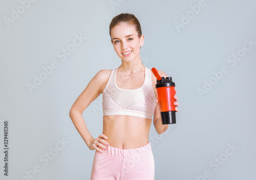 Sporty young woman with pro...