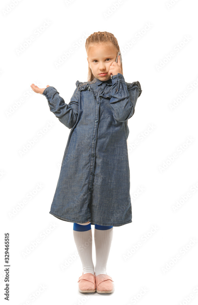 Cute little girl talking by mobile phone on white background Cute little girl talking by mobile phone on white background