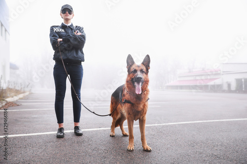 Female police officer with ...