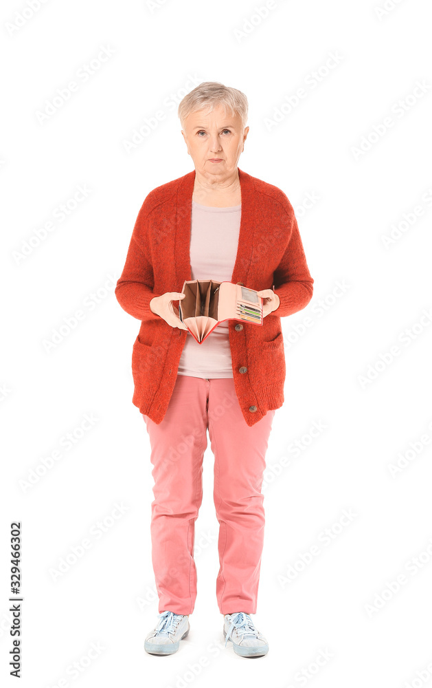 Senior woman with empty wallet on white background